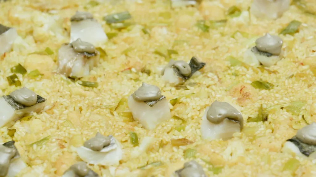 Paella de floricol alls tendres i abadejo